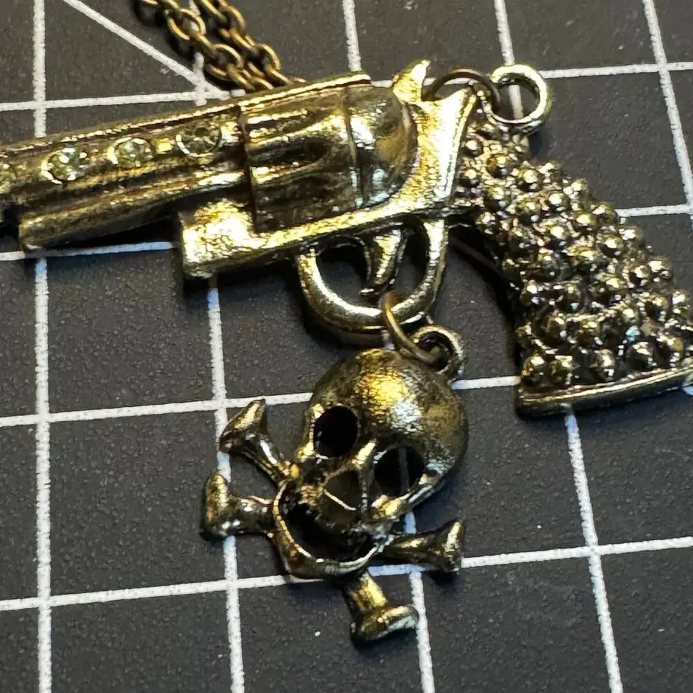 Antique gold tone rhinestone embellished pistol pendant necklace wester cowgirl